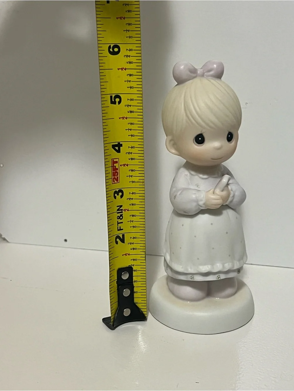 Precious Moments figurine “The Good Lord Always Delivers” from 1989